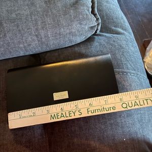Like new black and hot pink Kate Spade wallet.